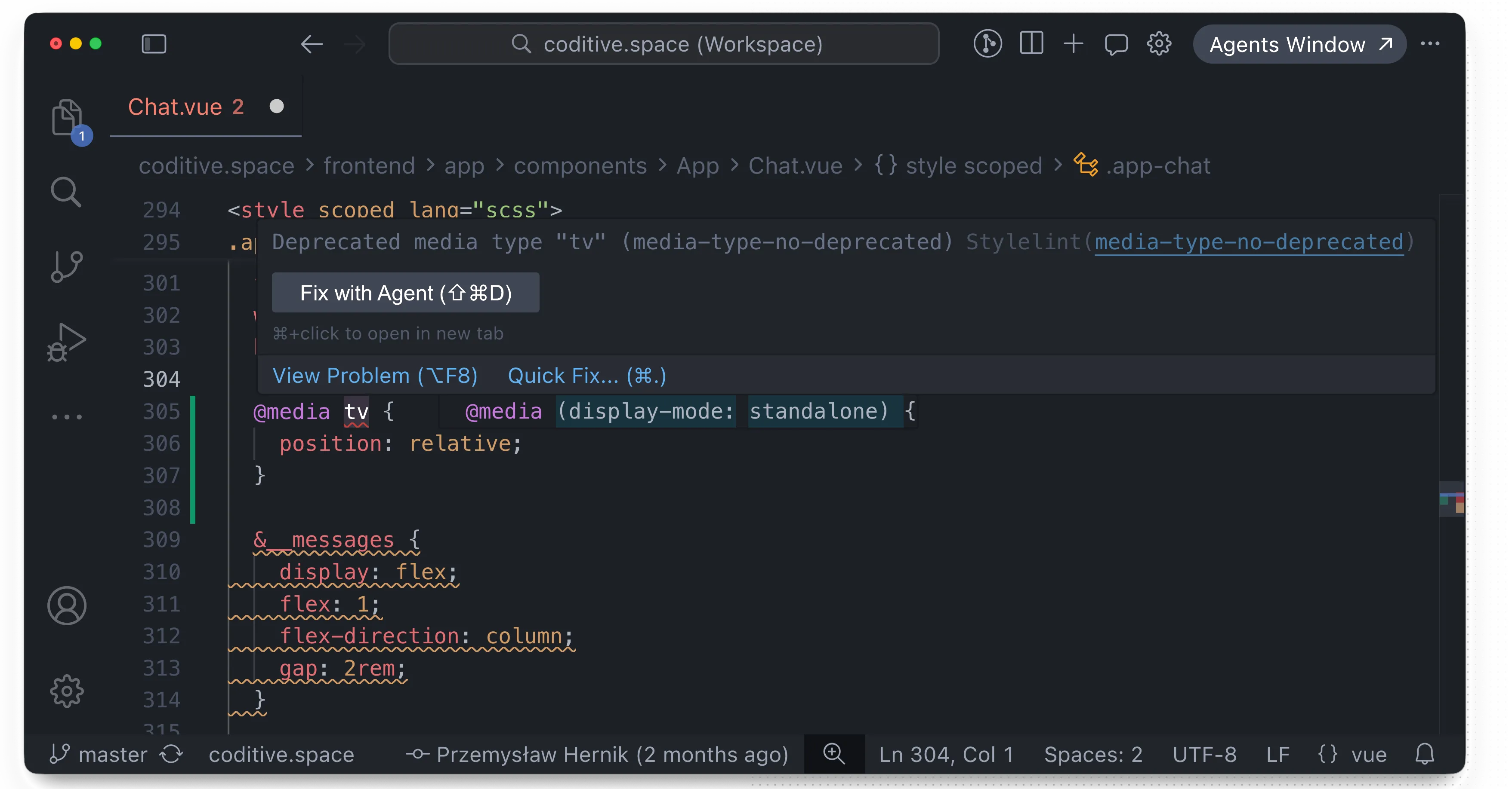 A code editor showing a deprecated media type warning in a Vue SCSS file.